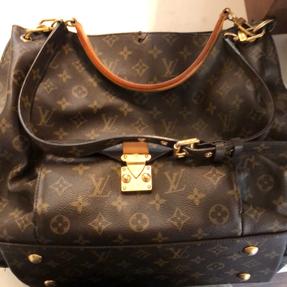 Louis Vuitton with receipt, dust bag and box.